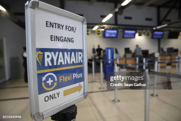 RyanAir check-in counter stands at Schoenefeld Airport near Berlin during a 24-hour strike by RyanAir pilots on August 10, 2018 in Schoenefeld,...