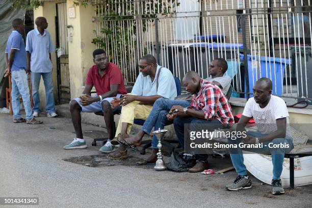 Sudanese Refugees in Via Scorticabove demonstrate against the imminent clearing of the camp set up outside the building where they lived, which was...