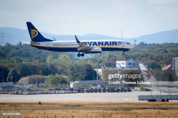 An aircraft of discount airliner RyanAir lands during a 24-hour strike by the pilots at Frankfurt Airport on August 10, 2018 in Frankfurt, Germany....