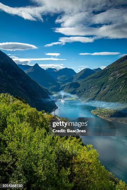 geirangerfjord - cruise ships pollute - geiranger stock pictures, royalty-free photos & images