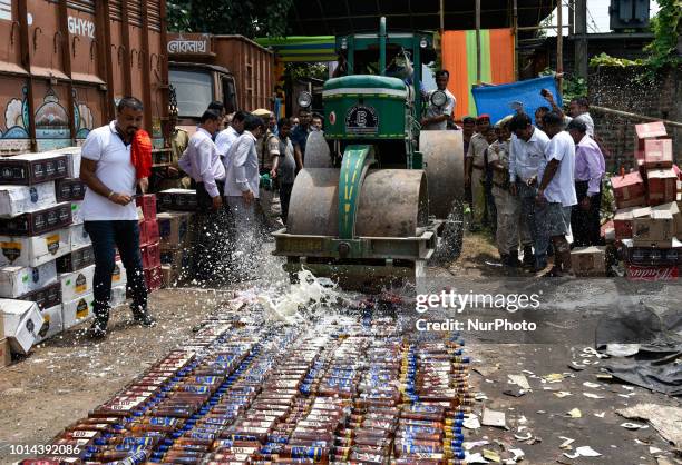 Joint team of Excise and Assam Police official destructed seized liquor under the supervision of team of officials and under the aegis of Assam...