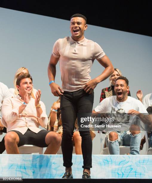 Wes Nelson dances during the 'Love Island Live' photocall at ICC Auditorium on August 10, 2018 in London, England.
