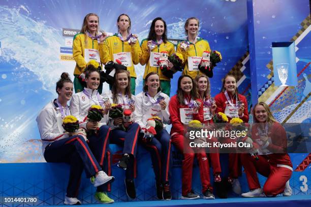 Gold medalists Australia, silver medalists United States and bronze medalists Canada celebrate on the podium at the medal ceremony for the Women's...