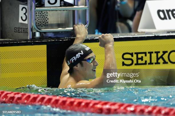 Daiya Seto of Japan celebrates winning the gold medal after competing in the Men's 200m Butterfly Final on day two of the Pan Pacific Swimming...