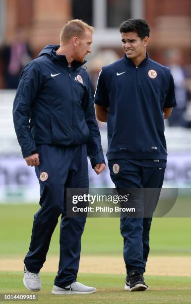 Steve Kirby and Arjun Tendulkar walk off the field during the 2nd Specsavers Test Match between England and India at Lord's Cricket Ground on August...