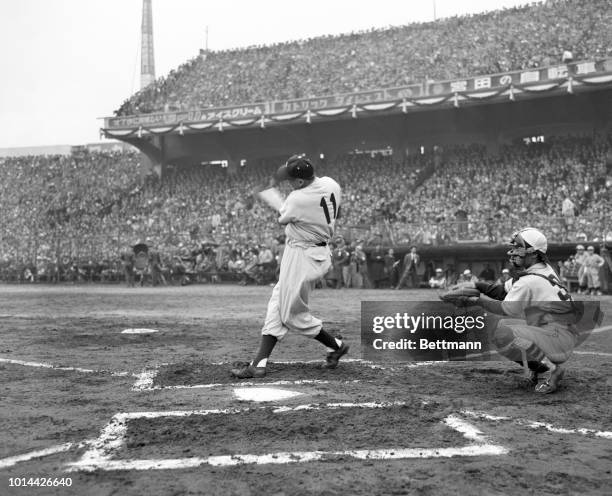 Manager Lefty O'Doul of the San Francisco Seals now barnstorming in Japan, takes a healthy cut at the ball as a pinch-hitter during a game against...