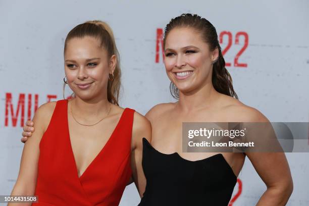 Julia De Mars and Ronda Rousey attends the Premiere Of STX Films' "Mile 22" at Westwood Village Theatre on August 9, 2018 in Westwood, California.