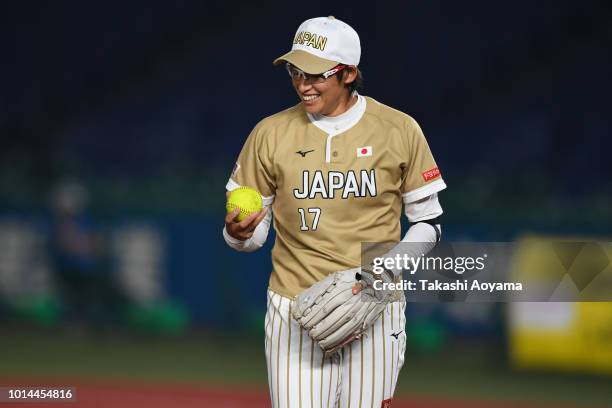 Yukiko Ueno of Japan pitches against Puerto Rico during the Playoff Round at ZOZO Marine Stadium on day nine of the WBSC Women's Softball World...