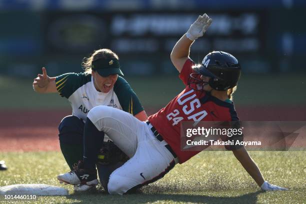 Kirsti Lenae Merritt of United States is tagged out by Stacey Jean McManus of Australia in the sixth inning during their Playoff Round at ZOZO Marine...