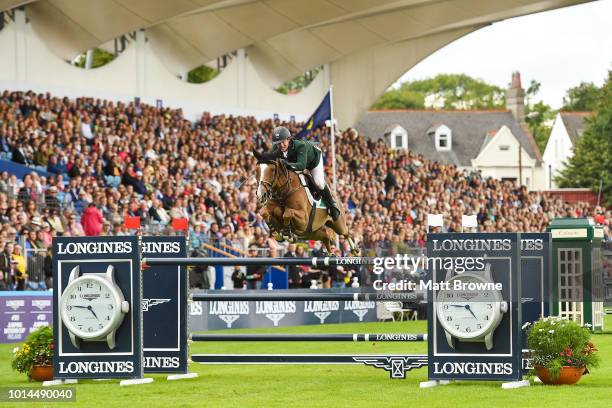 Dublin , Ireland - 10 August 2018; Shane Sweetnam of Ireland competing on Main Road jumps the last during the second round of the Longines FEI...