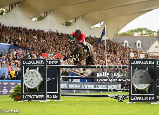 Dublin , Ireland - 10 August 2018; Enrique Gonzalez of Mexico competing on Chacna jumps the last during the Longines FEI Jumping Nations Cup of...