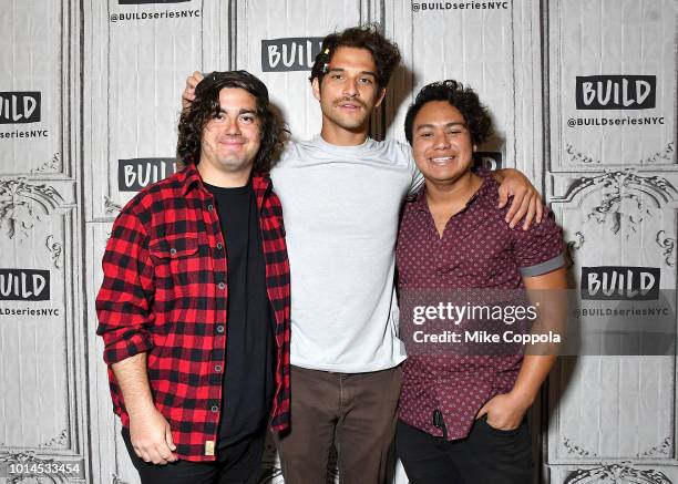 Nick Guzman, Tyler Posey, and Freddy Ramirez of the band PVMNTS pose for a photo during their visit to Build Studio on August 10, 2018 in New York...