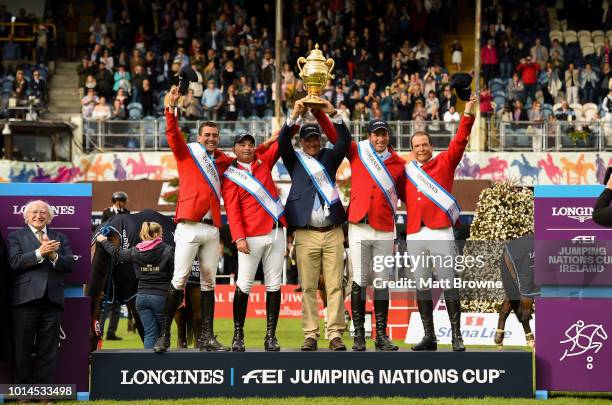 Dublin , Ireland - 10 August 2018; The Mexico team celebrate with the trophy presented by President Michael D Higgins, left, following the Longines...