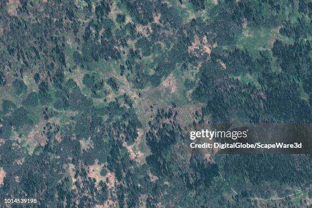 DigitalGlobe via Getty Images satellite image of the Elk Moose geoglyph on slopes of the Zyuratkul Mountains in the Chelyabinsk region in Russia.