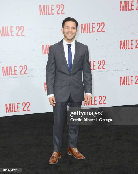 Actress Carlo Alban arrives for the Premiere Of STX Films' "Mile 22" held at Westwood Village Theatre on August 9, 2018 in Westwood, California.