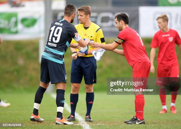 Vedad Ibisevic of Hertha BSC and Stefanos Polizos of Aiginiakos FC before the test match between Hertha BSC and Aiginiakos FC at the Athletic Area...