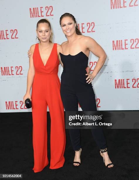 Julia De Mars and Ronda Rousey arrive for the Premiere Of STX Films' "Mile 22" held at Westwood Village Theatre on August 9, 2018 in Westwood,...