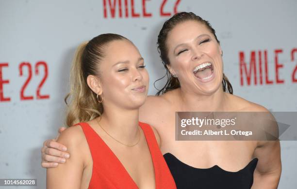 Julia De Mars and Ronda Rousey arrive for the Premiere Of STX Films' "Mile 22" held at Westwood Village Theatre on August 9, 2018 in Westwood,...