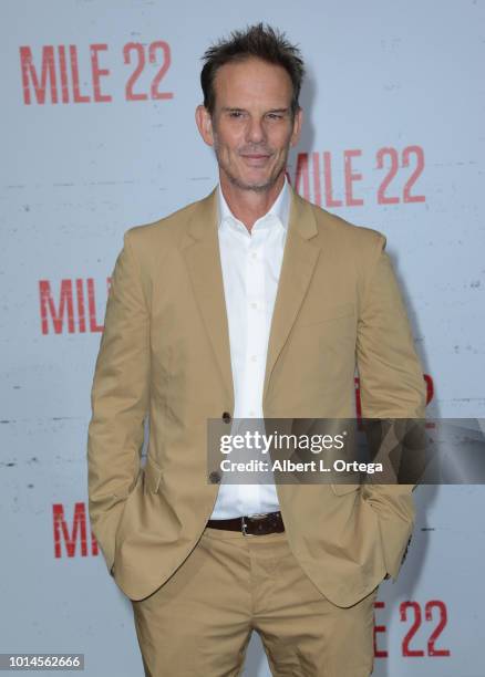 Director Peter Berg arrives for the Premiere Of STX Films' "Mile 22" held at Westwood Village Theatre on August 9, 2018 in Westwood, California.