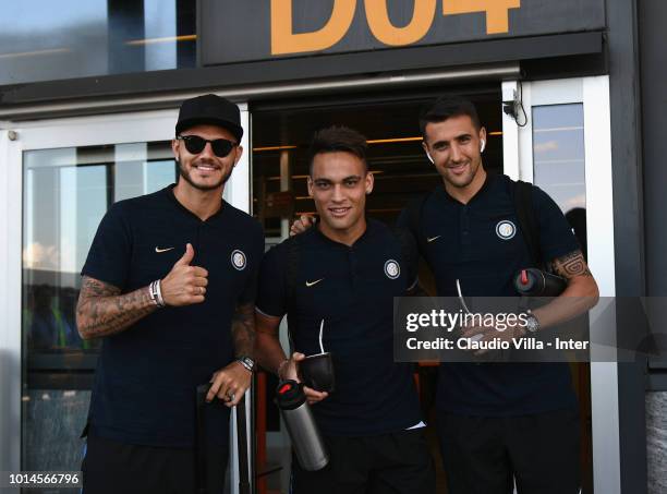 Mauro Icardi, Lautaro Martínez and Matias Vecino of FC Internazionale depart from Malpensa Airport on August 10, 2018 in Milan, Italy.