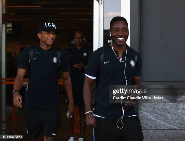 Dalbert Henrique Chagas Estevão and Kwadwo Asamoah of FC Internazionale depart from Malpensa Airport on August 10, 2018 in Milan, Italy.