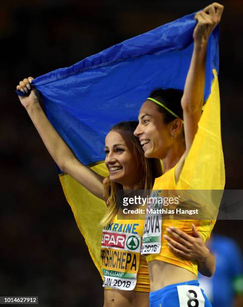 Lyakhova Olha of Ukraine celebrates winning Bronze with Nataliya Pryshchepa of Ukraine who celebrates winning Gold in the Women's 800m Final during...