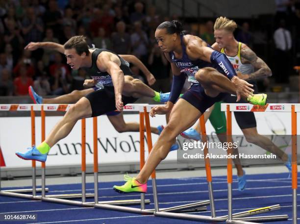 Pascal Martinot-Lagarde of France and Sergey Shubenkov of Authorised Neutral Athlete compete in the Men's 110m Hurdles Final during day four of the...