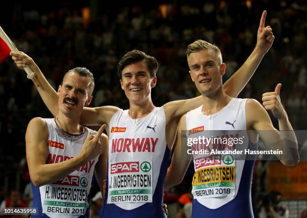 Henrik Ingebrigsten of Norway, Jakob Ingebrigtsen of Norway, and Filip Ingebrigsten of Norway celebrate as Jakob Ingebrigtsen of Norway wins Gold in...