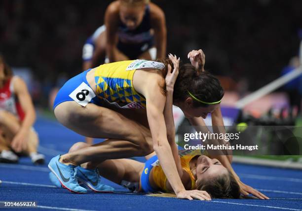 Bronze medalist Olha Lyakhova of Ukraine and Gold medalist Nataliya Pryshchepa of Ukraine celebrate after the Women's 800m Final during day four of...