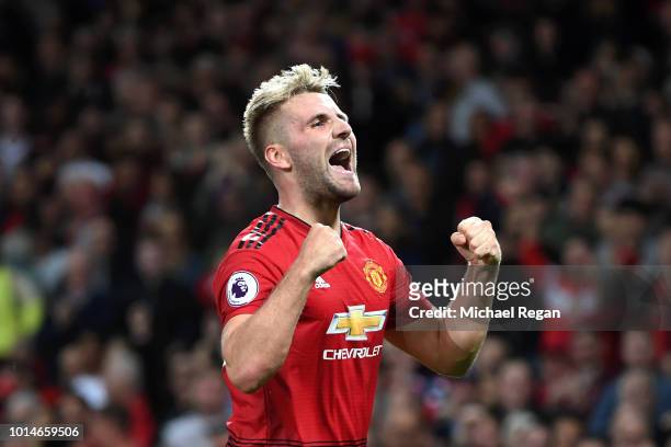 Luke Shaw of Manchester United celebrates after scoring his team's second goal during the Premier League match between Manchester United and...