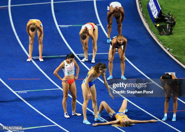 Nataliya Pryshchepa of Ukraine lies on the ground moments after she wins Gold in the Women's 800mn Final during day four of the 24th European...