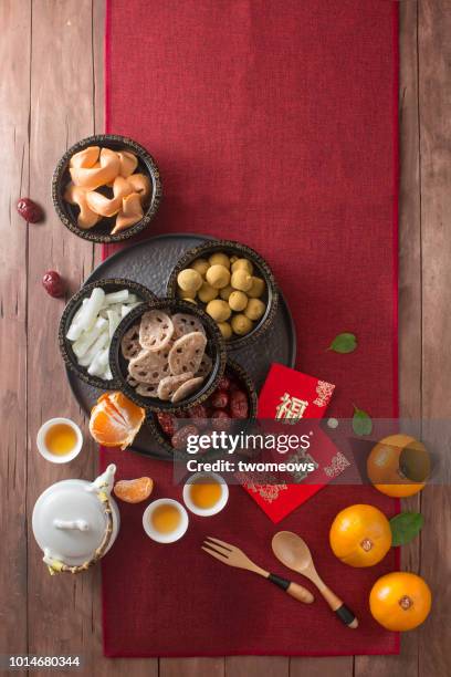 flat lay chinese new year food and drink still life. - lunar new year cup 2017 stock-fotos und bilder