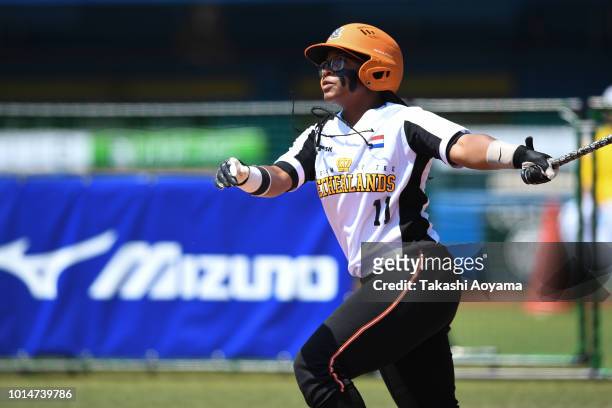 Soclaina Naphtalini Van Gurp of Netherlands hits solo home run in the second inning against Canada during their Playoff Round at ZOZO Marine Stadium...