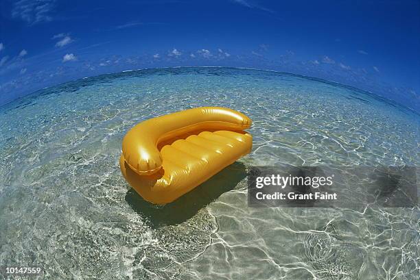 yellow loveseat, cok islands, south pacific - bubble chair stock pictures, royalty-free photos & images