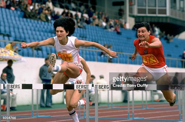 Morgolina of the USSR and Grazyna Rabsztyn of Poland in action during a Womens Hurdles event at the European Championships in Prague, Czechoslovakia....