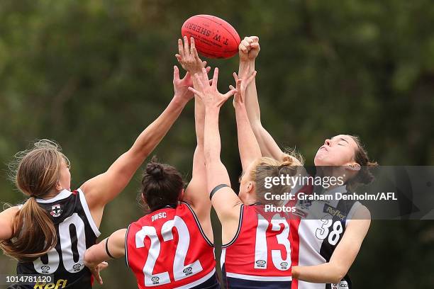 Selena Karlson of the Southern Saints competes in the air during the round 14 VFLW match between Darebin and the Southern Saints at Bill Lawry Oval...