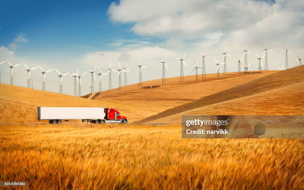 Truck on the road going in the american countryside
