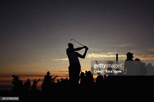 Player Stephen Curry of the Golden State Warriors hits his second shot on the 18th hole during Round Two of the Ellie Mae Classic at TBC Stonebrae on...