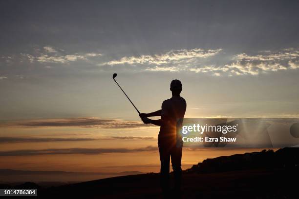 Player Stephen Curry of the Golden State Warriors hits his second shot on the 17th hole during Round Two of the Ellie Mae Classic at TBC Stonebrae on...