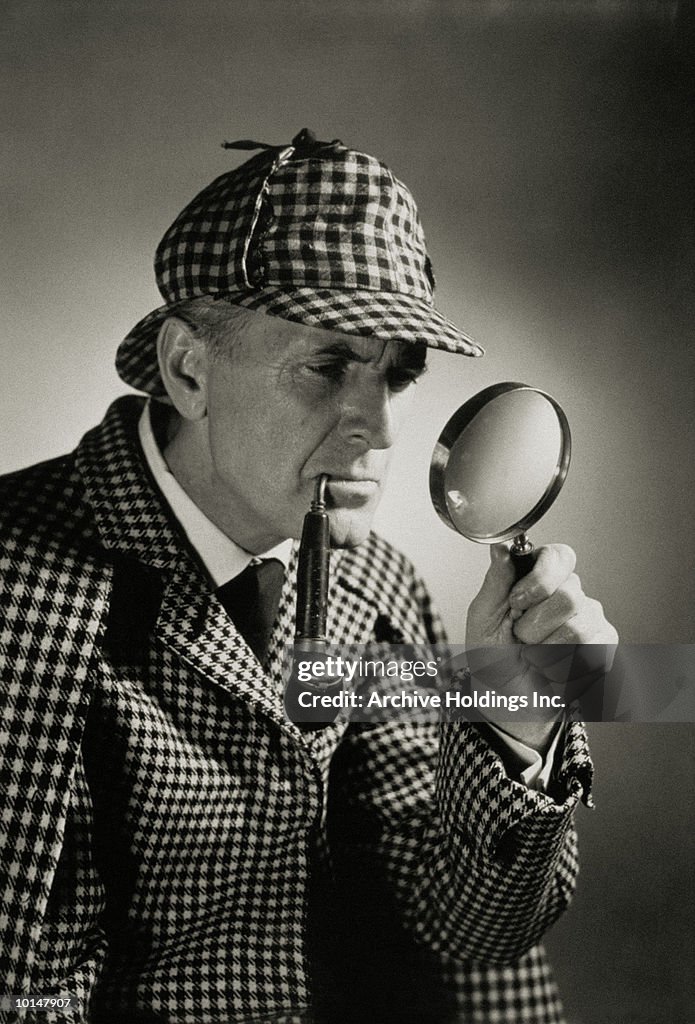 MAN DRESSED AS SHERLOCK HOLMES