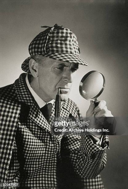 man dressed as sherlock holmes - detective stock pictures, royalty-free photos & images
