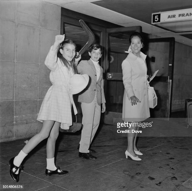 Anglo-Indian actress Merle Oberon at Heathrow Airport with her children Bruno and Francesca, London, UK, 4th August 1969.
