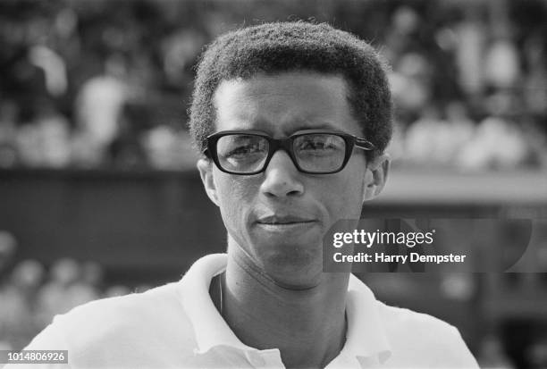 American tennis player Arthur Ashe at Wimbledon during the semifinal match against Rod Laver, All England Lawn Tennis and Croquet Club, London, UK,...