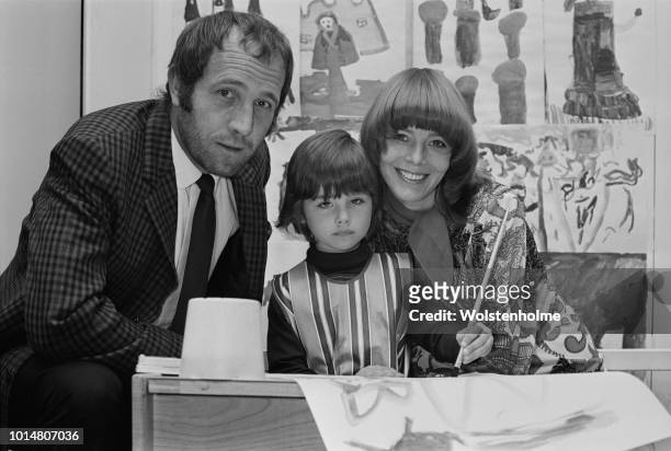 English actor Ian Hendry and English actress Janet Munro with their daughter Sally at an art competition held at Harrods, London, UK, 13th August...