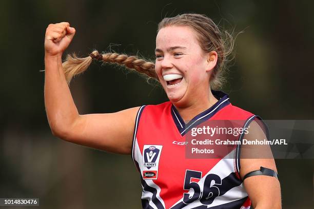 Maddison Wilson of Darebin celebrates kicking a goal during the round 14 VFLW match between Darebin and the Southern Saints at Bill Lawry Oval on...