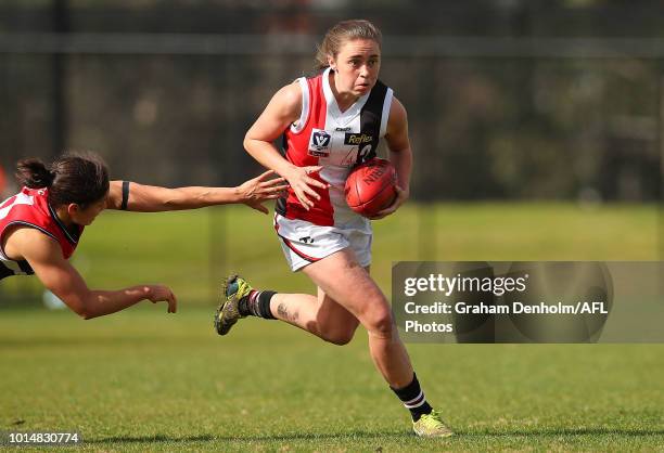 Courtney Jones of the Southern Saints runs with the ball during the round 14 VFLW match between Darebin and the Southern Saints at Bill Lawry Oval on...