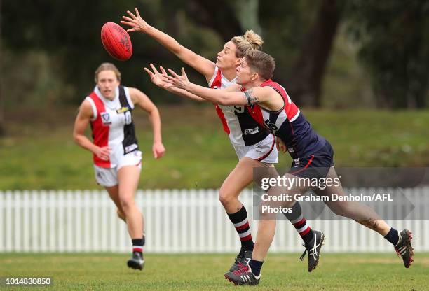 Stephanie Binder of the Southern Saints reaches for the ball during the round 14 VFLW match between Darebin and the Southern Saints at Bill Lawry...