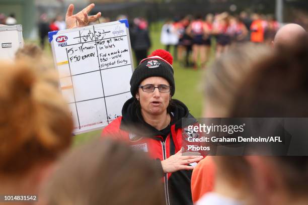 Southern Saints Head Coach Peta Searle talks to her players during the round 14 VFLW match between Darebin and the Southern Saints at Bill Lawry Oval...