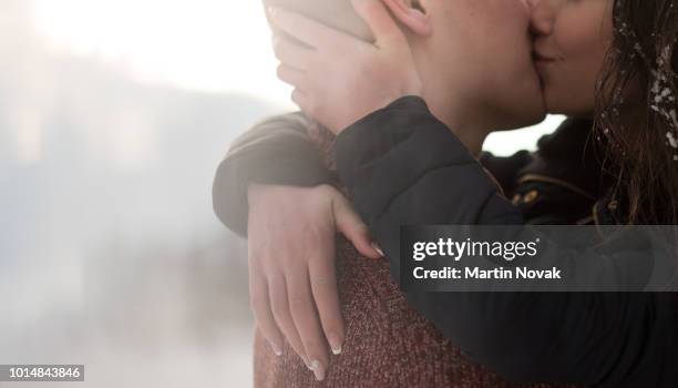 love couple kissing passionately, closeup shot. - teenagers kissing stock pictures, royalty-free photos & images