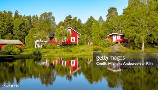 scenic reflections at gla forest nature reserve, sweden, scandinavia - cottage imagens e fotografias de stock